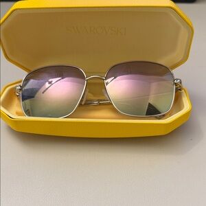 Swarovski Sunglasses with Silver Frame and Pink Lenses